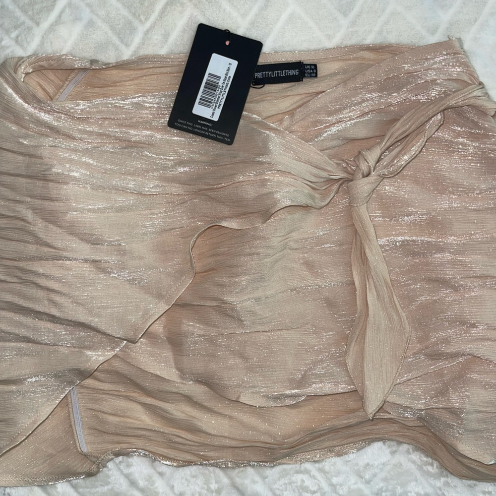 PrettyLittleThing Cream Ruched Mini Skirt